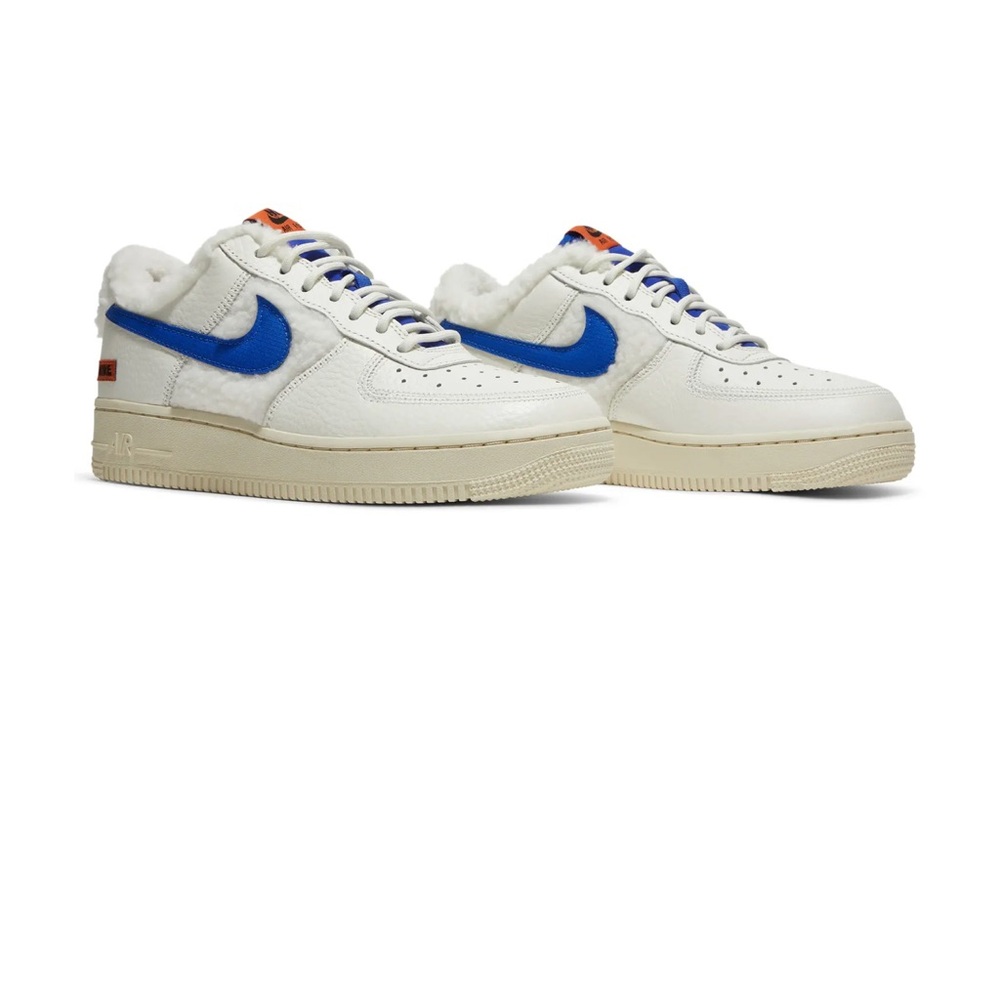 Nike Women’s White and Blue Sneakers